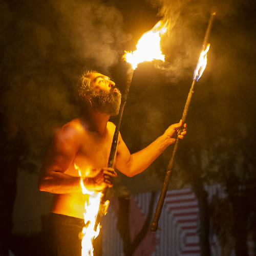 Into the fire: Miguel Rubio, nighttime shot, fire juggling in vivid colors