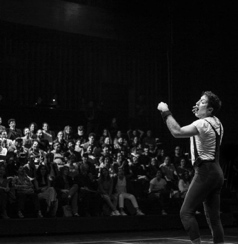 ImproLocura indoor version with Agro the clown. Agro on the stage . Black and white image